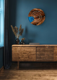 Commode,With,Decor,In,Living,Room,Interior,,Dark,Blue,Wall